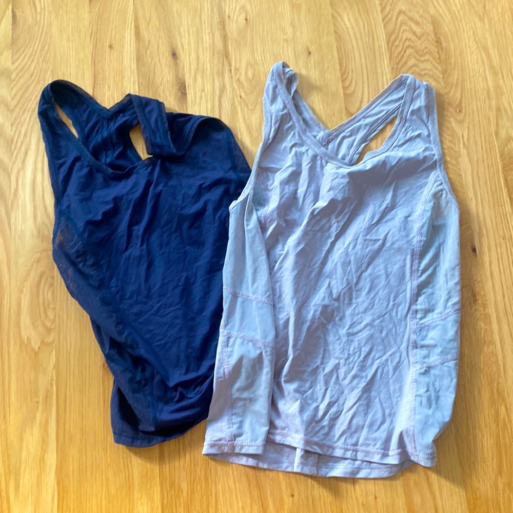 Two workout tanks with mesh panelling